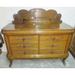 A 20th Century oak sideboard with three