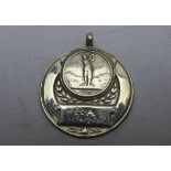 A 9ct gold 1940 golfing medallion, appro