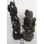 Two Tibetan carved wood models of mythic