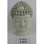 A Chinese blanc de chine head of Buddha,