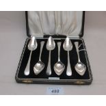 A set of six silver grapefruit spoons, B