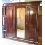 A late Victorian mahogany triple wardrob