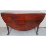 A 19th Century mahogany oval drop leaf p