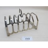 A silver toast rack, Sheffield 1932, app