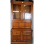 A C1960's Ercol Golden Dorm bookcase wit