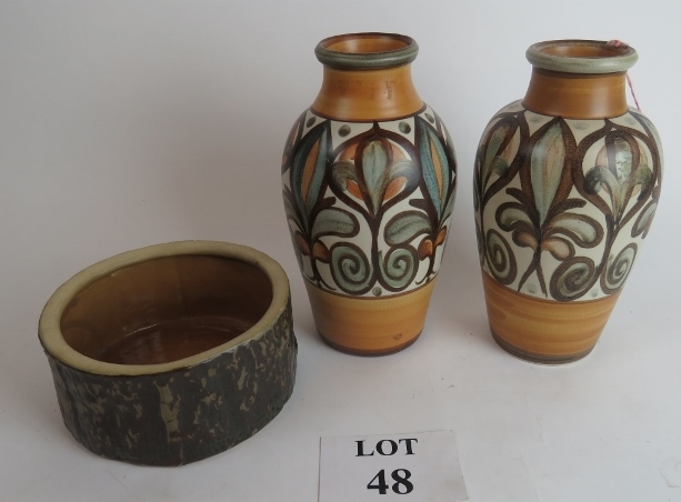 A pair of Langley vases with a foliage p