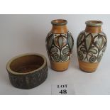 A pair of Langley vases with a foliage p