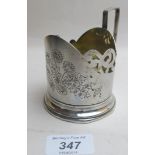 A Russian tea glass holder, engraved wit