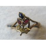 A 9ct gold ring in the shape of a flower