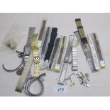 A large collection of watch straps and w