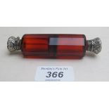 A double ended red glass scent bottle es