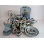 A large collection of Scottish Buchan Pottery, all hand-painted,