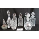 A selection of decanters, all with stoppers in cut glass,