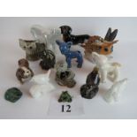 A collection of ceramic animal models, to include a Russian fish, two Denby cotton-tail lambs,