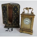 A good quality 19th century French miniature carriage clock, enamel dial, pretty cast case,