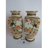 A pair of signed Japanese Satsuma pottery vases, c.