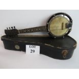 An early 20th century rosewood cased small banjo, with travel case,