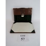 A vintage leather travelling writing case, loop handle,