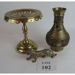 Three decorative brass items, a tiger wi