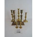 Two pairs of brass candlesticks and thre