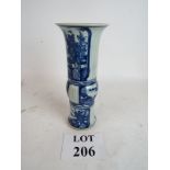 A Chinese vase with ribbed sections deco