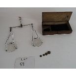 A set of apothecary scales with 10, 5 &