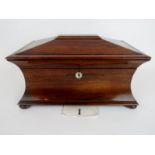 A good quality early Victorian rosewood tea caddy,