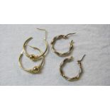 A pair of 9ct yellow and white gold hoop earrings,