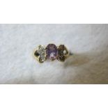 A 9ct gold amethyst set ring,