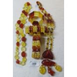 Three Polish amber necklaces and two bracelets est: £35-£45