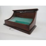 A good Victorian mahogany table-top display case with curved glass panel, rear door, lined interior,