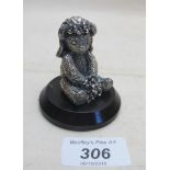 A silver 'bridal' Teddy bear on wooden base,