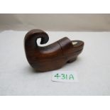 A 19th century mahogany novelty snuff box in the form of a shoe with turned up curly end,