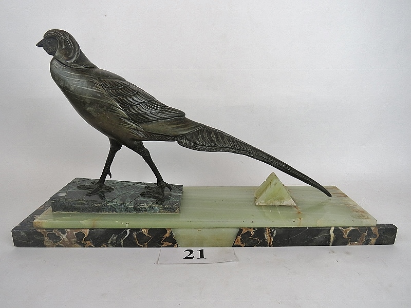 A French Art Deco bronzed metal and multi-coloured marble sculpture, depicting a pheasant,