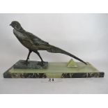 A French Art Deco bronzed metal and multi-coloured marble sculpture, depicting a pheasant,