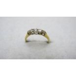 A five stone graduated diamond ring, size O,