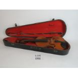 Violin in wooden case, bears the label Stradivanius Anno 1721 inside sound box, but certainly later,