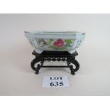 A Chinese jardiniere on fitted wooden stand in the Famille rose enamels with inscriptions,