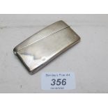 A silver card case,