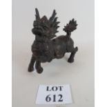 A Chinese replica cast metal dog of foe, 21 cm long,