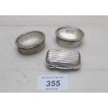 A pair of silver pill boxes,