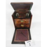 A good quality Victorian walnut writing box, domed hinged lid and fall front enclosing two inkwells,