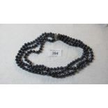 Triple row freshwater pearl necklace, 20",