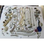 A large collection of mainly vintage jewellery to include a pair of malachite earrings and a