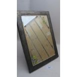 A silver framed easel mirror,