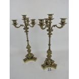 A pair of 20th century cast gilt-metal candelabra in the Georgian style,