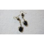 A pair of amethyst set drop earrings est: £30-£50