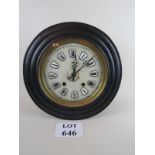 A 19th century French wall clock with enamel dial,