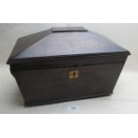 A rosewood sarcophagus tea caddy,