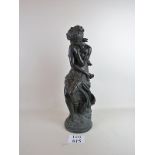 After Moreau (bronze covered) statue of a lady in the Roman style, 65 cm tall,